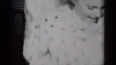 New York (1950): Black And White Footage Of Two Sisters Playing On A Chair In