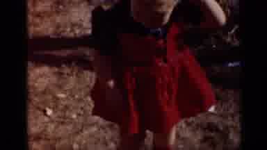 New York (1950): Girl Wearing Red And Black Dress Rubs Eyes Before Walking To