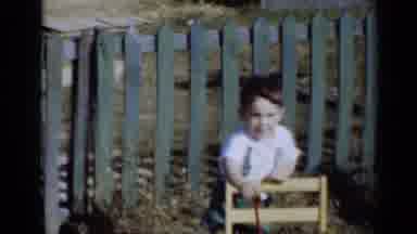 New York (1950): Little Boy Playing In The Backyard With His Toys And Pretending