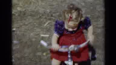 New York (1950): Cute Little Girl Sitting On A Little Red Tricycle Holding And