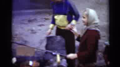 New York (1950): Group Of Women And Children Outside Wearing Coats Roasting