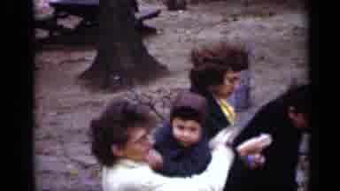 New York (1950): Woman Hold Toddler Then Wipes His Face As Another Woman Puts