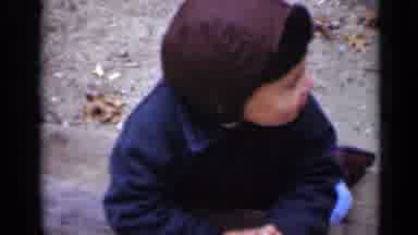 New York (1950): Young Toddler In Brown Cap Blue Jacket Blue Jeans And Brown Shoes