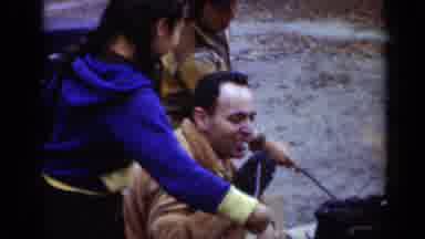 New York (1950): A Man With His Children At A Firecamp Having Marshmallow On A