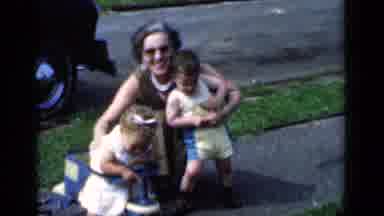 New York (1951): Mother Holding Two Babies And Two Girls Standing By A Fence