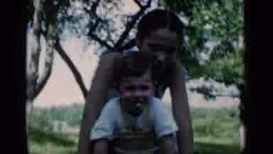 New York (1951): Black And White Video Of A Woman And Child Walking Down The