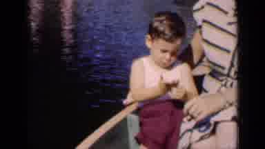 New York (1951): Family In Boat On Lake Floating Down The Water