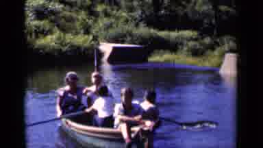 New York (1951): Adults And Kids In Row Boat On Body Of Water On Sunny Day Little
