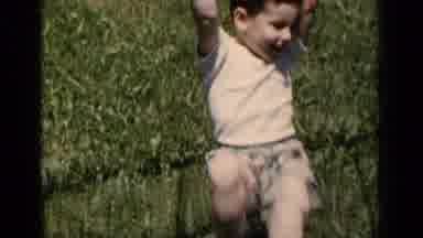 New York (1951): Kid Playing On Playground Swinging Around And Playing On The