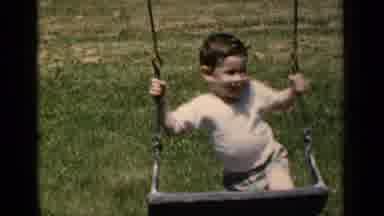 New York (1951): Young Boy Child Plays On A Swing Dressed In Summer Clothing