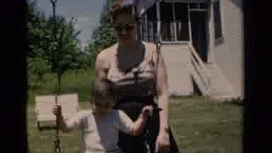 New York (1951): Mom Pushing Her Kid On The Swing Then She's Swinging Next To Him