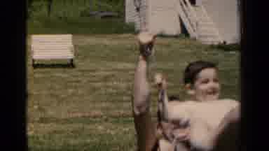 New York (1951): Woman In One Piece Swimsuit Walks Towards Shore As Others Splash