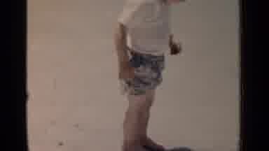 New York (1951): Little Boy In A White Shirt With Black Hair Standing For A Bit