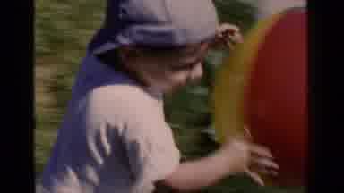 New York (1951): Little Boy Running With A Large Colorful Beach Ball To Throw It