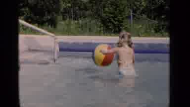 New York (1951): Young Girl In Swimming Pool Playing With Colorful Beach Ball
