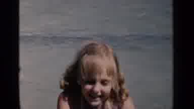 New York (1951): A Little Girl Floats In The Water While Holding A Ball