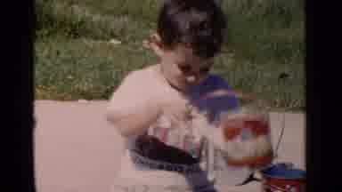 New York (1951): Young Boy Dumps Water From A Watering Can On His Head While