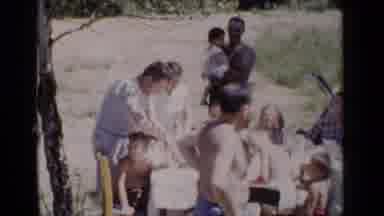 New York (1951): People Some In Swimwear Having A Picnic On A Sunny Day