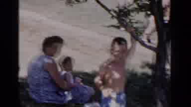New York (1951): A Mom With A Little Boy In Her Lap Watches Another Little Boy