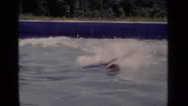 New York (1951): Swimmer Times Himself In Home Pool To Prepare For The Summer