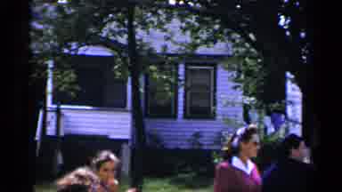 New York (1951): A Group Of People Standing Outside A Large House On A