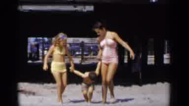 New York (1951): Mother And Daughter Hold Young Boy's Hands As They Walk He Does A