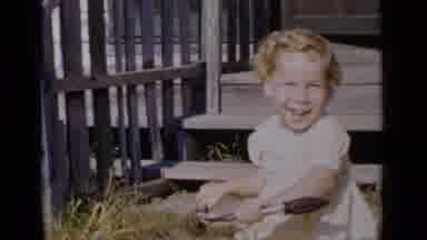 New York (1951): Little Girl Playing With Her Tricycle As People Watch And Help