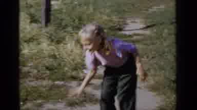 New York (1951): Little Girl Is Happy Playing Outside With A Pink Ball
