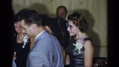 New York (1954): 50s Party Showing Multiple Young People In Dress Attire Smiling