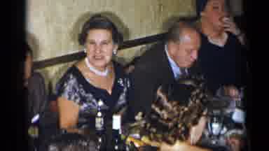 New York (1954): A Women Eats In A Gathering Of People For A Special Occasion