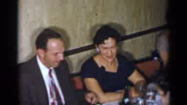 New York (1954): Men And Women Sitting At A Table Laughing And Talking A Woman