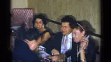New York (1954): Group Of People Wearing Formal Clothes Socializing And