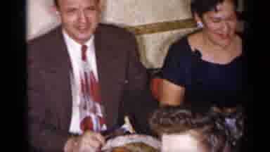 New York (1954): People Sitting At White Banquet Table Talking And Eating Dinner