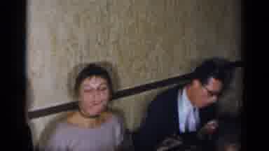 New York (1954): People In Suits And Dresses Socializing At A Dining Table