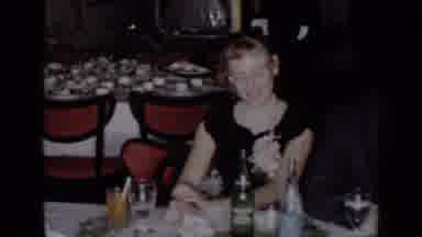 New York (1954): Three People Sit At White Restaurant Table Smiling At Camera