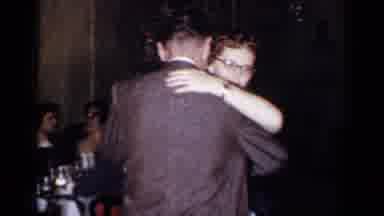 New York (1954): A Couple Dancing At A Holiday Party With A Meal Being Served