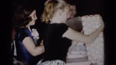 New York (1954): A Group Of Women Enjoying Unwrapping Presents That Have Just