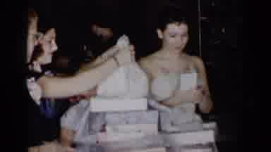 New York (1954): A Dress In A Stack Of Gifts Being Unwrapped At A Vintage American