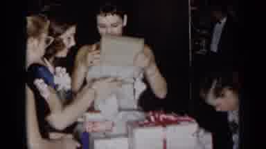 New York (1954): Woman Wearing Blue Dress Opens White Gift Box Displays Black