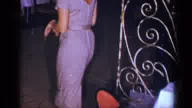 New York (1954): Pretty Woman In A Sparkly Purple Dress Doing Funny Dances At A