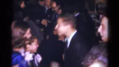 NEW YORK-1954: Young Couples Line Dancing At Formal Party