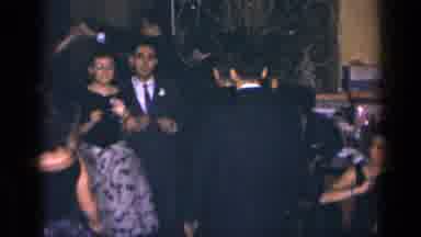 New York (1954): Man In A White Tuxedo Jacket Talks With A Woman In A Blue Dress