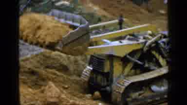 Birmingham Alabama (1957): Person Used Heavy Machinery To Move Dirt From Large