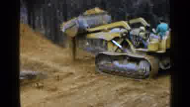 Birmingham Alabama (1957): Man Drives Loader Full Of Dirt Then Little Girl Handles