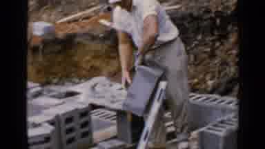 Birmingham Alabama (1957): Men Working On Roof Of House In The Woods