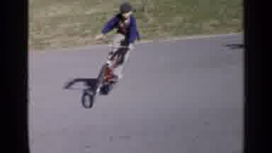 Birmingham Alabama (1957): Group Of Kids Riding Their Bikes On The Street Playing