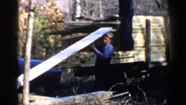 Birmingham Alabama (1957): Lumber Being Unloaded From A Lumber Truck By Two