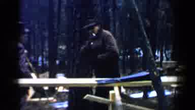 Birmingham Alabama (1957): Man Wearing Black Hat Pulls Object From Inner Pocket Of