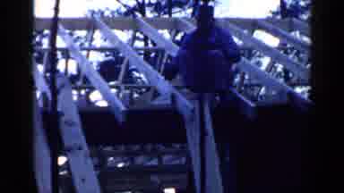 Birmingham Alabama (1957): Men Building Homes In Winter While Fire Keeps Them Warm