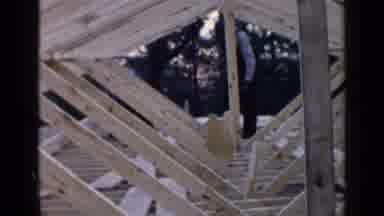 Birmingham Alabama (1957): A Man Wearing Overalls And A Blue Shirt Hammers The